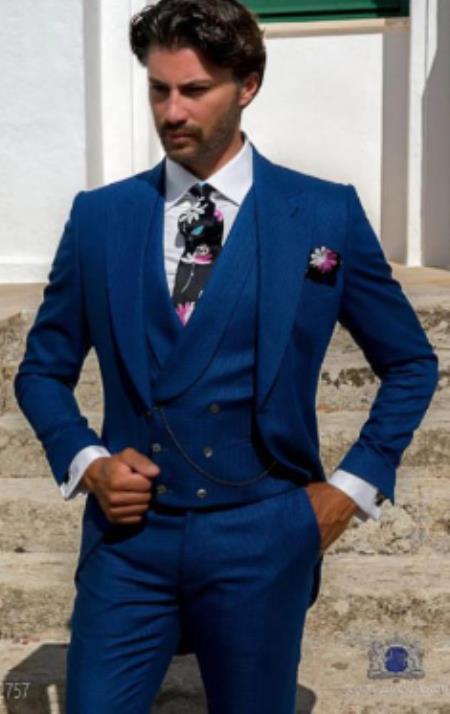 man wearing sapphire blue suit with vest