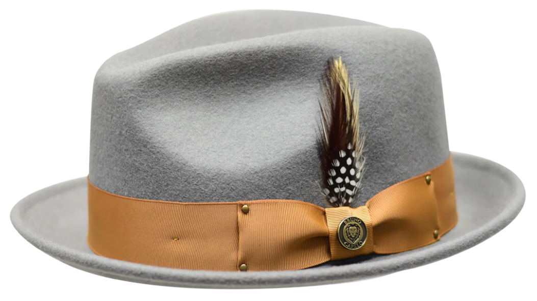 A gray fedora hat with a wide brim, featuring a tan ribbon band and a decorative feather attached.