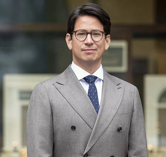 CEO wearing gray double breasted suit
