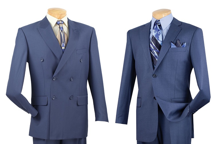 Two navy blue suits, one with double breasted and the other single breasted, displayed on mannequins.