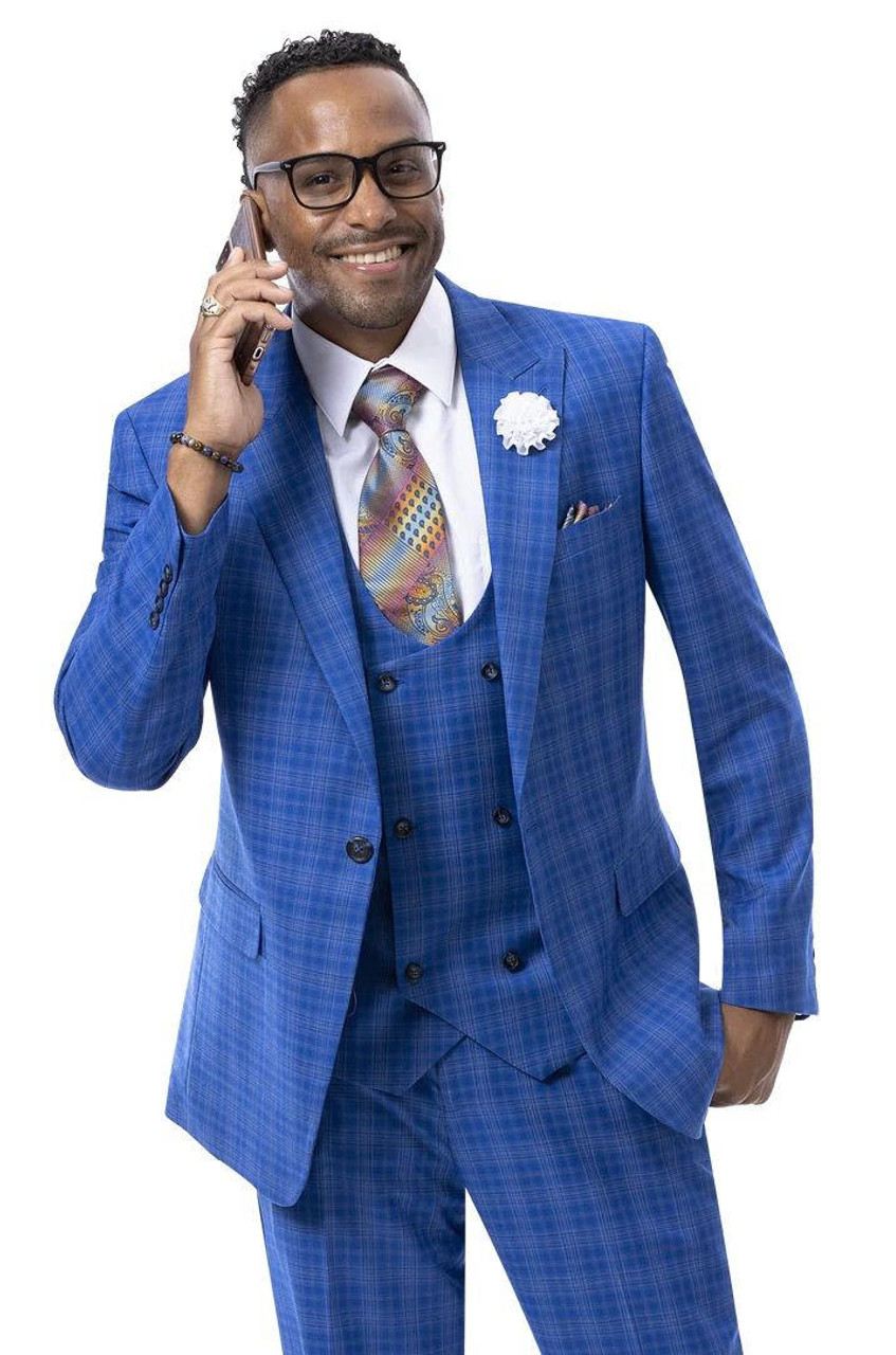 man wearing a fashionable blue plaid suit with vest