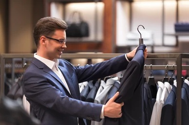 man buying a discounted suit