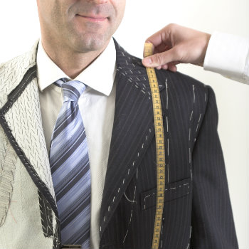 man having suit custom made