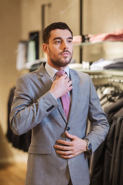 man trying on cheap suit